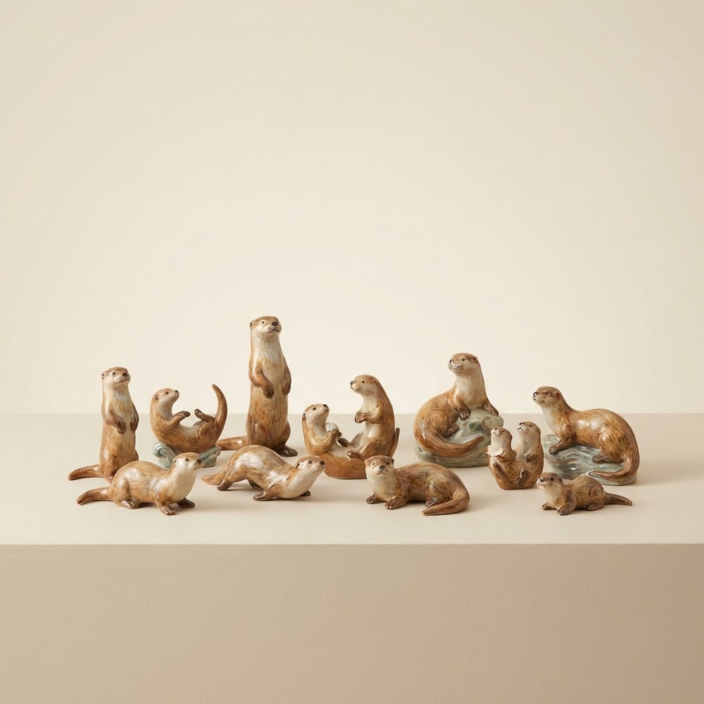 Садовые фигурки выдр