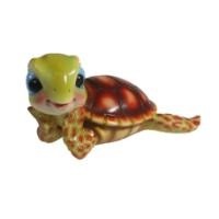 Декоративная садовая фигурка "Черепашка загорает" Декоративная садовая фигурка "Черепашка загорает"