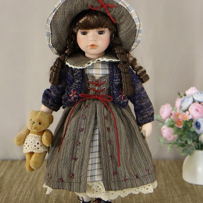 Кукла фарфоровая 16' на подставке